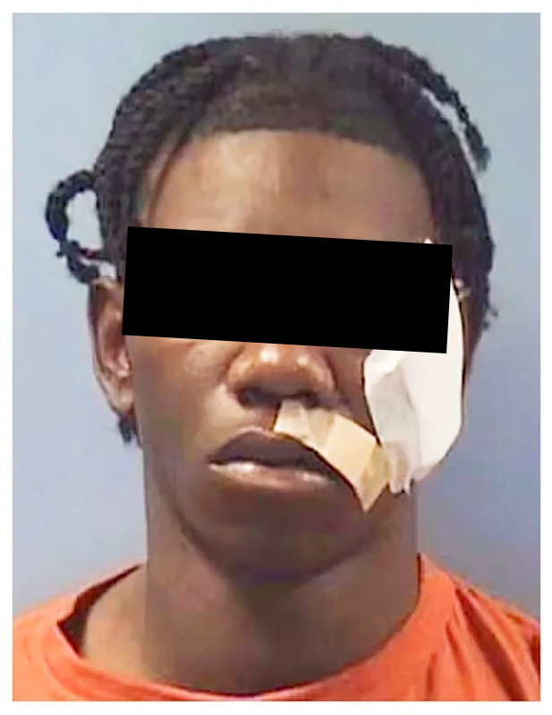 Op de foto staat Marquez Williams, waarbij zijn ogen bedekt zijn met een zwarte balk. De foto werd kort na zijn arrestatie genomen en toont een zwarte man in een oranje shirt. Op zijn bovenlip is een pleister geplakt en op zijn wang is een wit stuk verband geplakt.